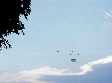 © Norbert Pousseur - Singapour - ciel et hélicoptère