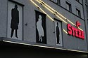 Façade de magasin en écairage de nuit - Baden - © Norbert Pousseur