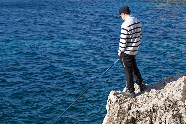 Pêcheur sur rocher - Nice - © Norbert Pousseur